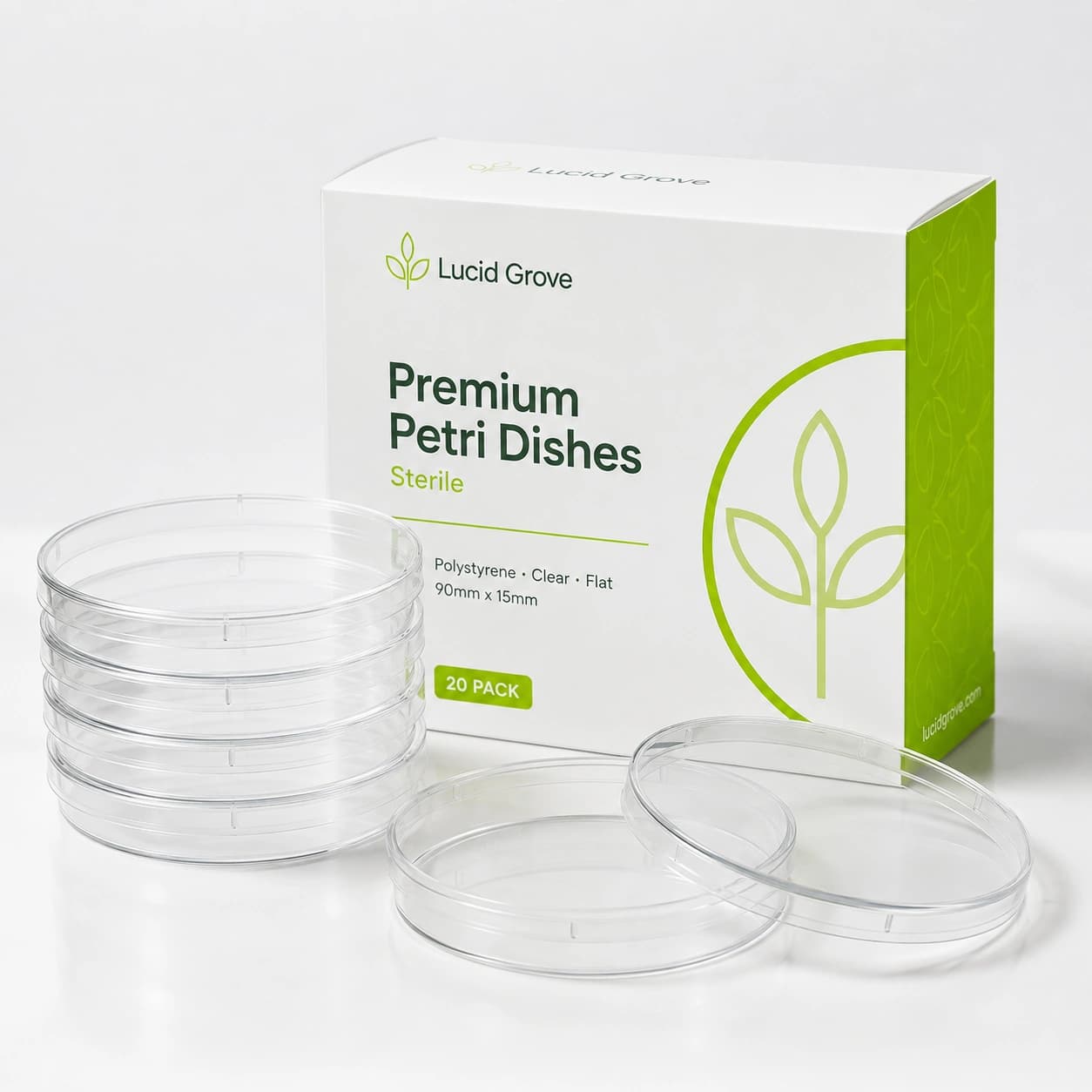 A stack of Lucid Grove sterile clear petri dishes beside their box.