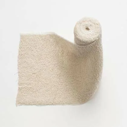 Crepe bandage 15cm x 4.5m Qualicare photographed against a plain background.
