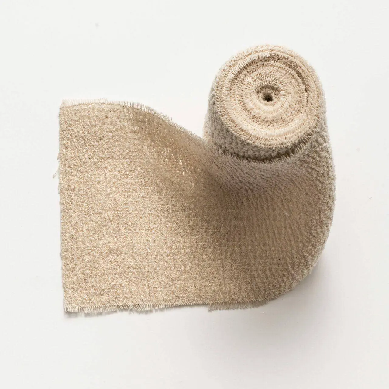 Rocialle 10cm Sterile Crepe Bandage Double Wrapped photographed against a plain background.