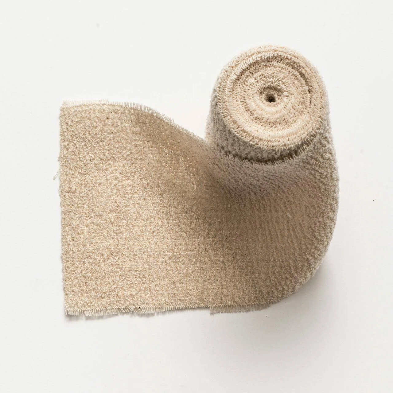 Rocialle 10cm Sterile Crepe Bandage Double Wrapped photographed against a plain background.